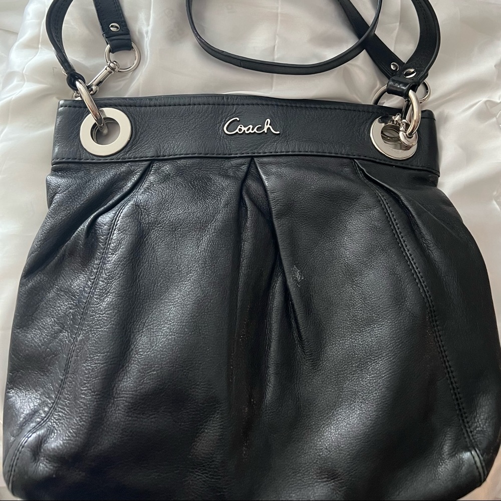 Black Coach leather bag with small and long detachable strap.